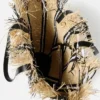 The Bambola Asymmetric bucket bag