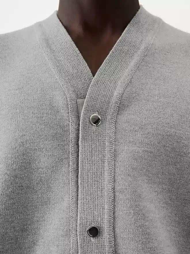 The buttoned cardigan Buttoned cardigan The buttoned cardigan Buttoned cardigan