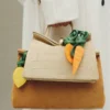 The orange Knotted orange-shaped bag charm