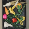 The orange Knotted orange-shaped bag charm