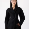 The Curvo coat Round-shoulder coat The Curvo coat Round-shoulder coat