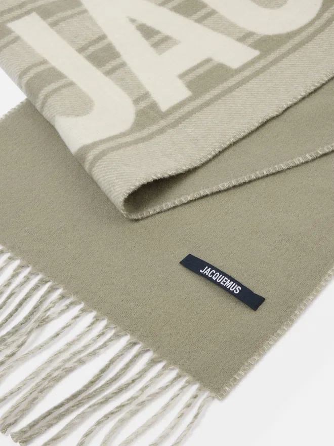 The Jacquemus scarf Fringe logo scarf The Jacquemus scarf Fringe logo scarf