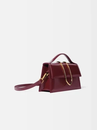 The large Bambino Cross-body metal flap bag