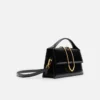 The large Bambino Cross-body metal flap bag The large Bambino Cross-body metal flap bag