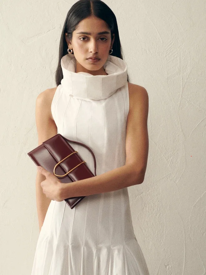 The large Bambino Cross-body metal flap bag The large Bambino Cross-body metal flap bag