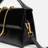 The large Bambino Cross-body metal flap bag The large Bambino Cross-body metal flap bag