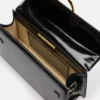 The large Bambino Cross-body metal flap bag The large Bambino Cross-body metal flap bag