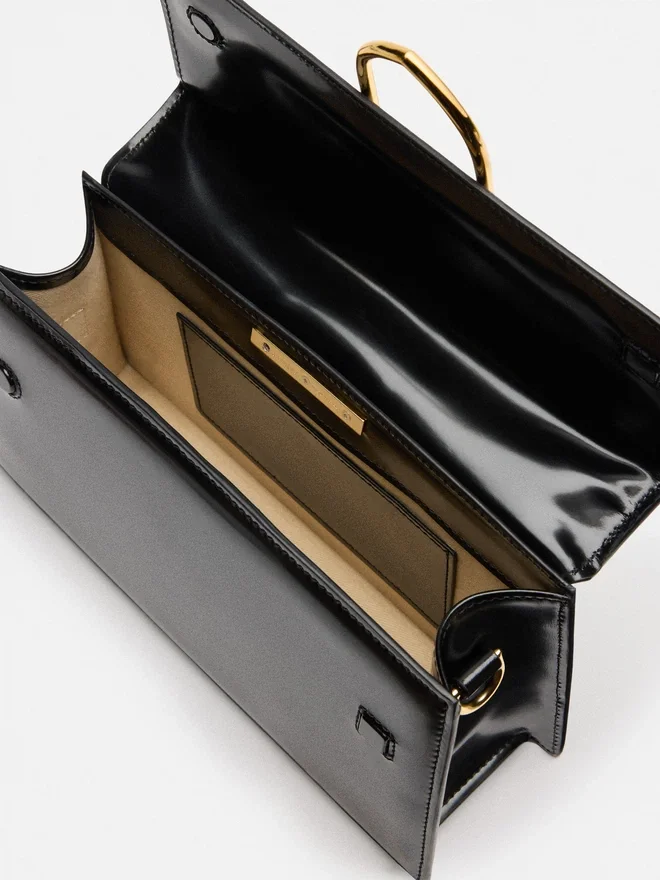 The large Bambino Cross-body metal flap bag The large Bambino Cross-body metal flap bag
