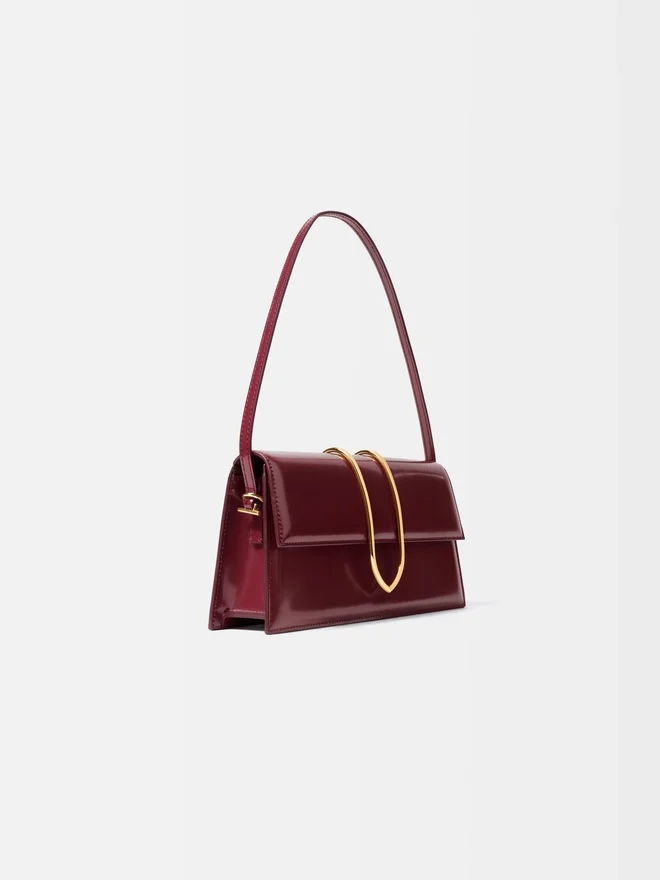 The long Bambino Long metal flap bag The long Bambino Long metal flap bag