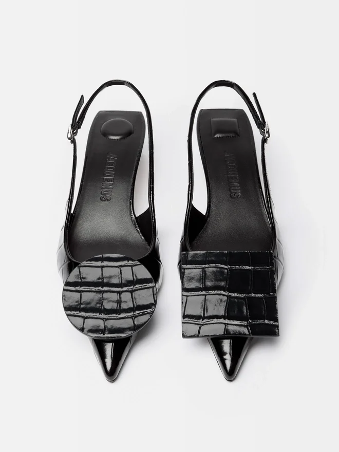 The low Duelo slingbacks Circle and square kitten heels The low Duelo slingbacks Circle and square kitten heels