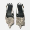 The low Duelo slingbacks Circle and square kitten heels The low Duelo slingbacks Circle and square kitten heels