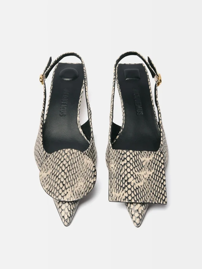 The low Duelo slingbacks Circle and square kitten heels The low Duelo slingbacks Circle and square kitten heels