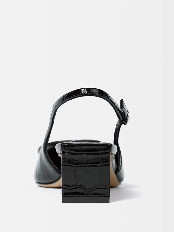 The low Duelo slingbacks Circle and square kitten heels The low Duelo slingbacks Circle and square kitten heels