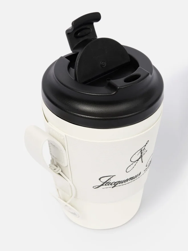 The Montaigne mug Travel mug – sold exclusively online and in our Paris store The Montaigne mug Travel mug – sold exclusively online and in our Paris store