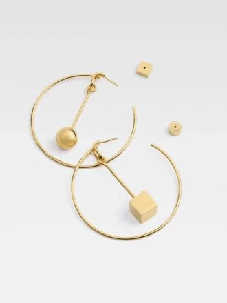 The Nodo hoops earrings Asymmetric hoop earrings The Nodo hoops earrings Asymmetric hoop earrings