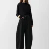 The Ovalo de-Nîmes denim pants High-waisted curved jeans The Ovalo de-Nîmes denim pants High-waisted curved jeans