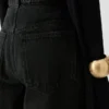 The Ovalo de-Nîmes denim pants High-waisted curved jeans The Ovalo de-Nîmes denim pants High-waisted curved jeans