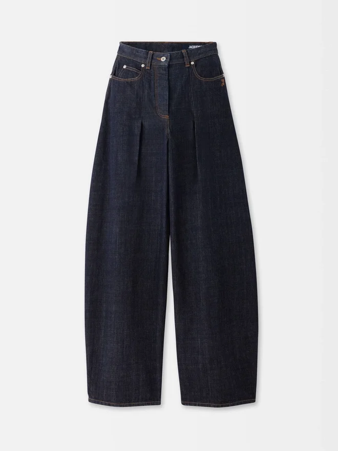 The Ovalo de-Nîmes denim pants High-waisted curved jeans The Ovalo de-Nîmes denim pants High-waisted curved jeans