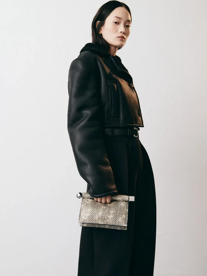 The small Rond Carré clutch Mini take-away pouch bag The small Rond Carré clutch Mini take-away pouch bag