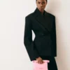 The small Rond Carré clutch Mini take-away pouch bag The small Rond Carré clutch Mini take-away pouch bag