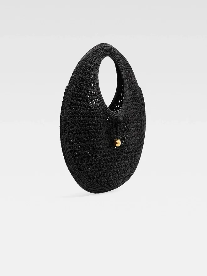 The Spiaggia round bag Raffia circle bag The Spiaggia round bag Raffia circle bag