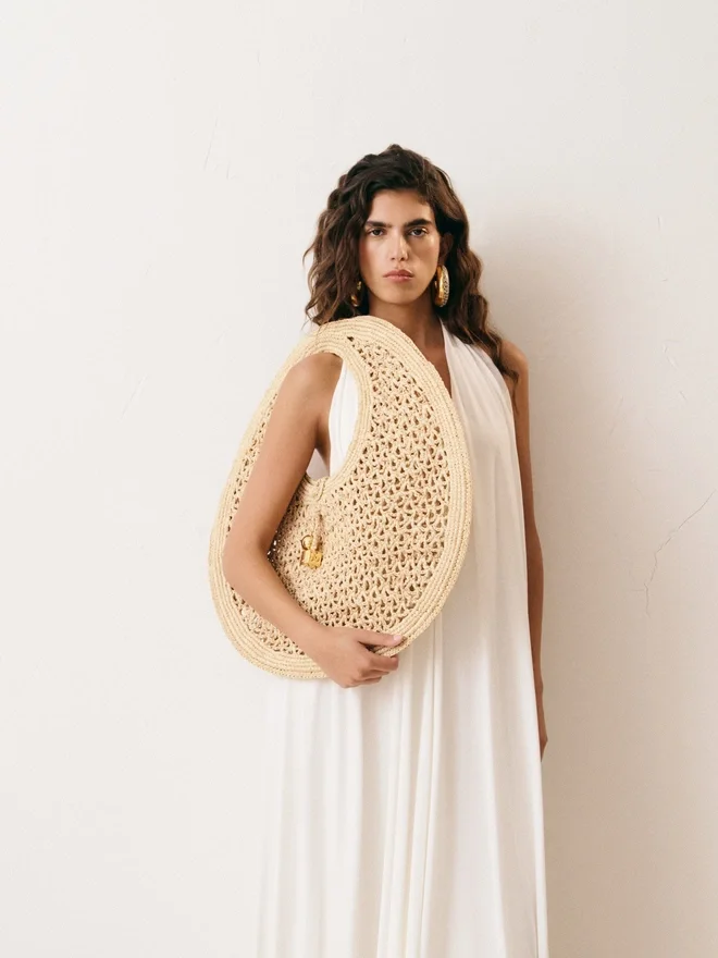 The Spiaggia round bag Raffia circle bag The Spiaggia round bag Raffia circle bag