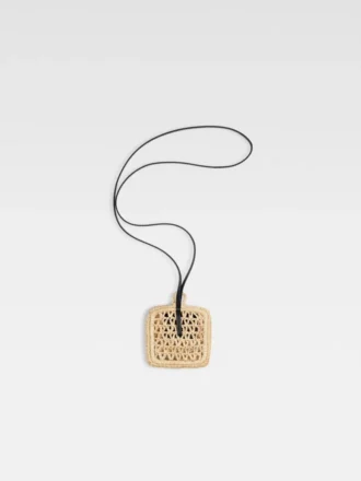 The Spiaggia wallet Raffia AirPods holder