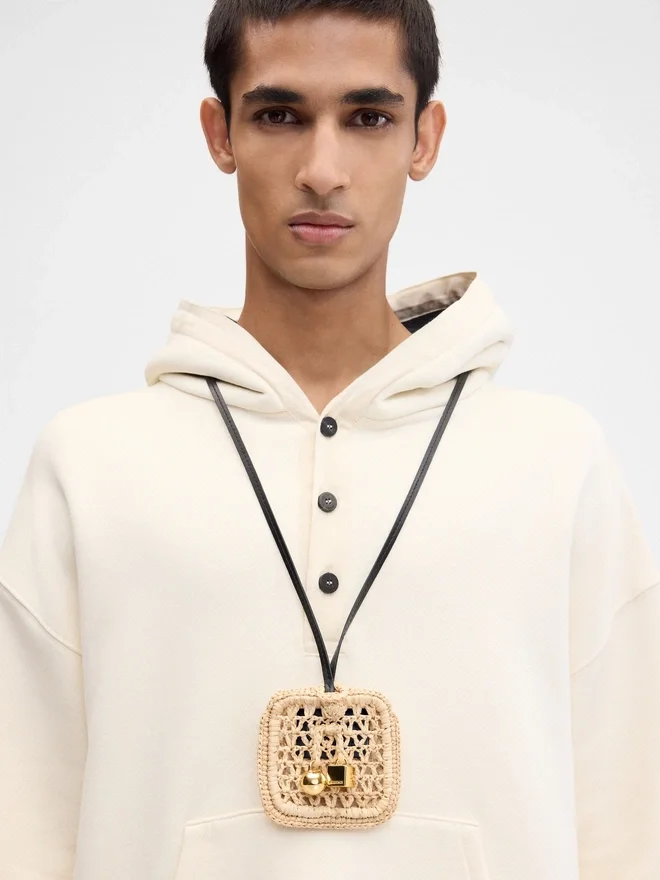 The Spiaggia wallet Raffia AirPods holder The Spiaggia wallet Raffia AirPods holder