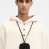 The Spiaggia wallet Raffia AirPods holder
