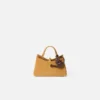 The watering can Watering can-shaped bag charm The watering can Watering can-shaped bag charm